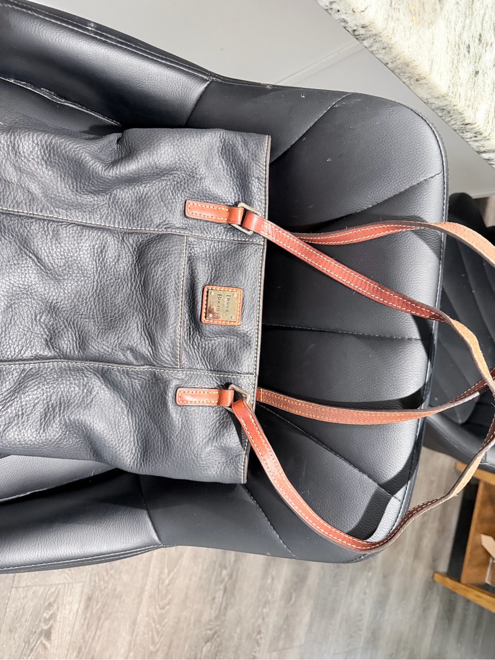 Dooney & Bourke Black Leather Tote with Brown Straps